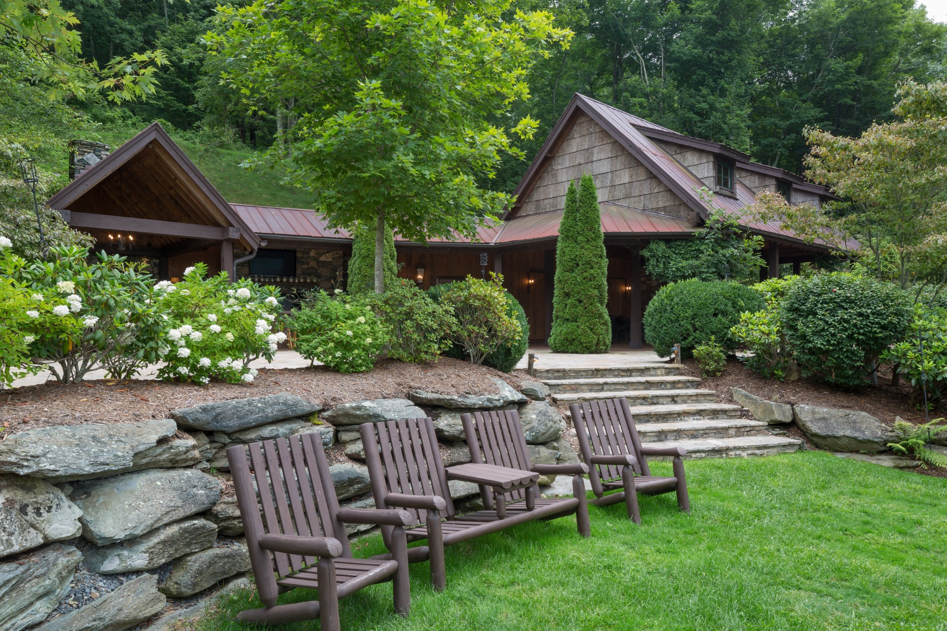 Diamond Creek shanty house exterior, Banner Elk NC — custom timber and stone construction